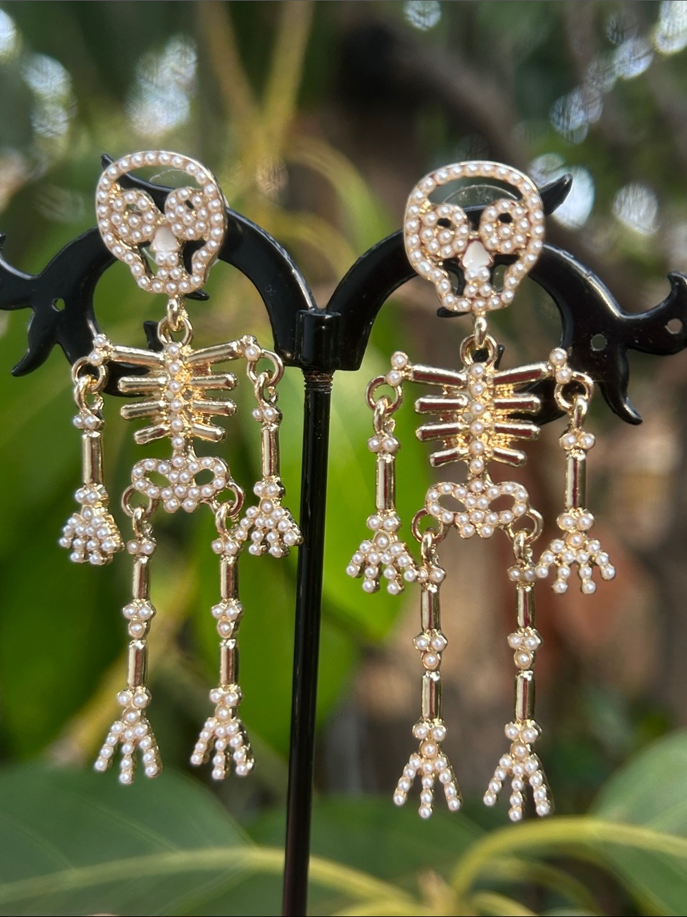 Plunder Gold Tone Articulated Skeletons Pierced Earrings